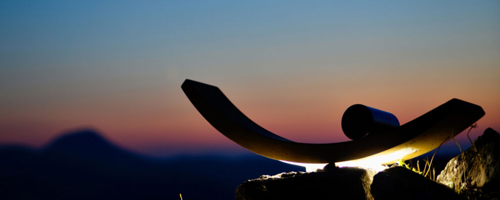 Orion wood dust lamp displayed in a modern interior setting