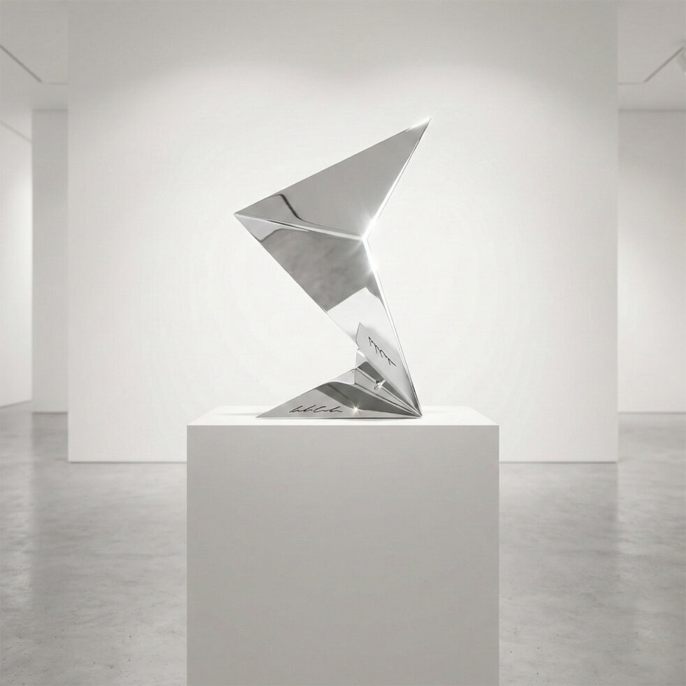 The Aurora lamp illuminated by its LED source, creating artistic reflections and shadows on the surrounding surface.