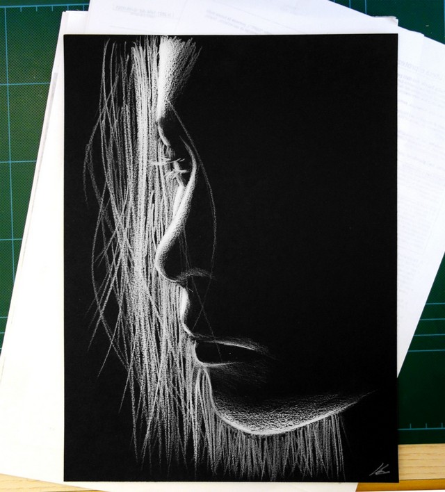 Black paper draw portrait.jpg