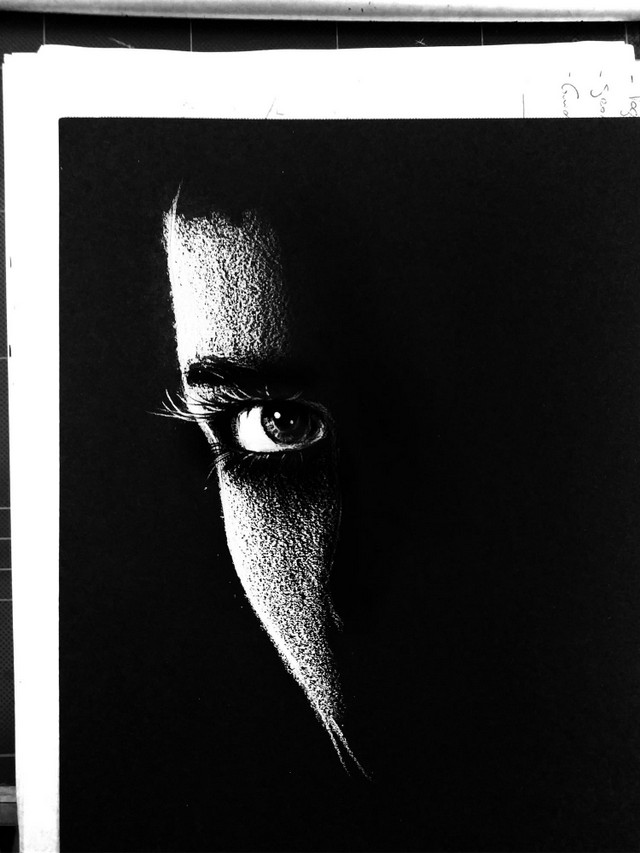 Woman eye sketch on black paper.jpg
