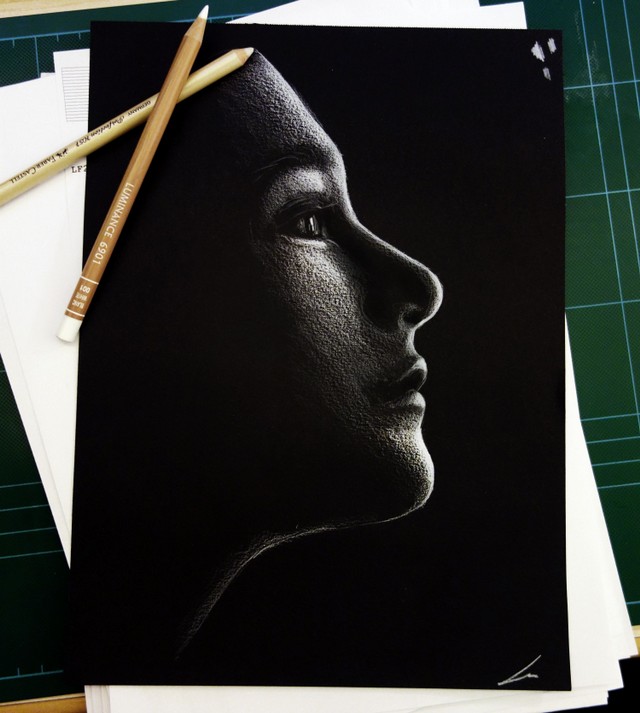 Woman sketch on black paper.jpg