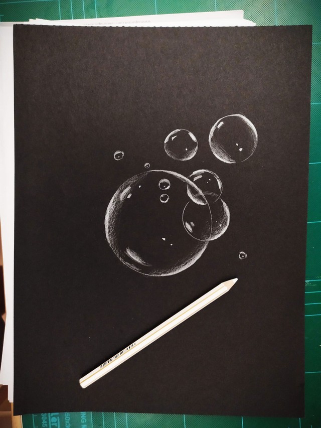 water-drop-sketch-on-black-paper-1.jpg