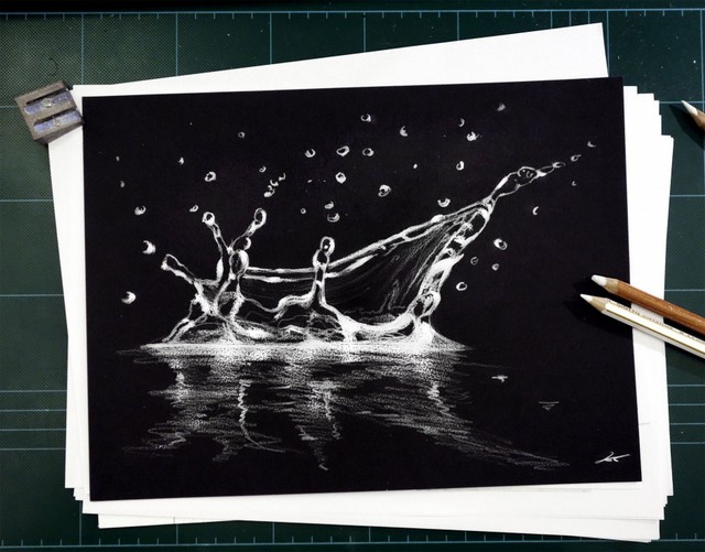 water-drop-sketch-on-black-paper.jpg